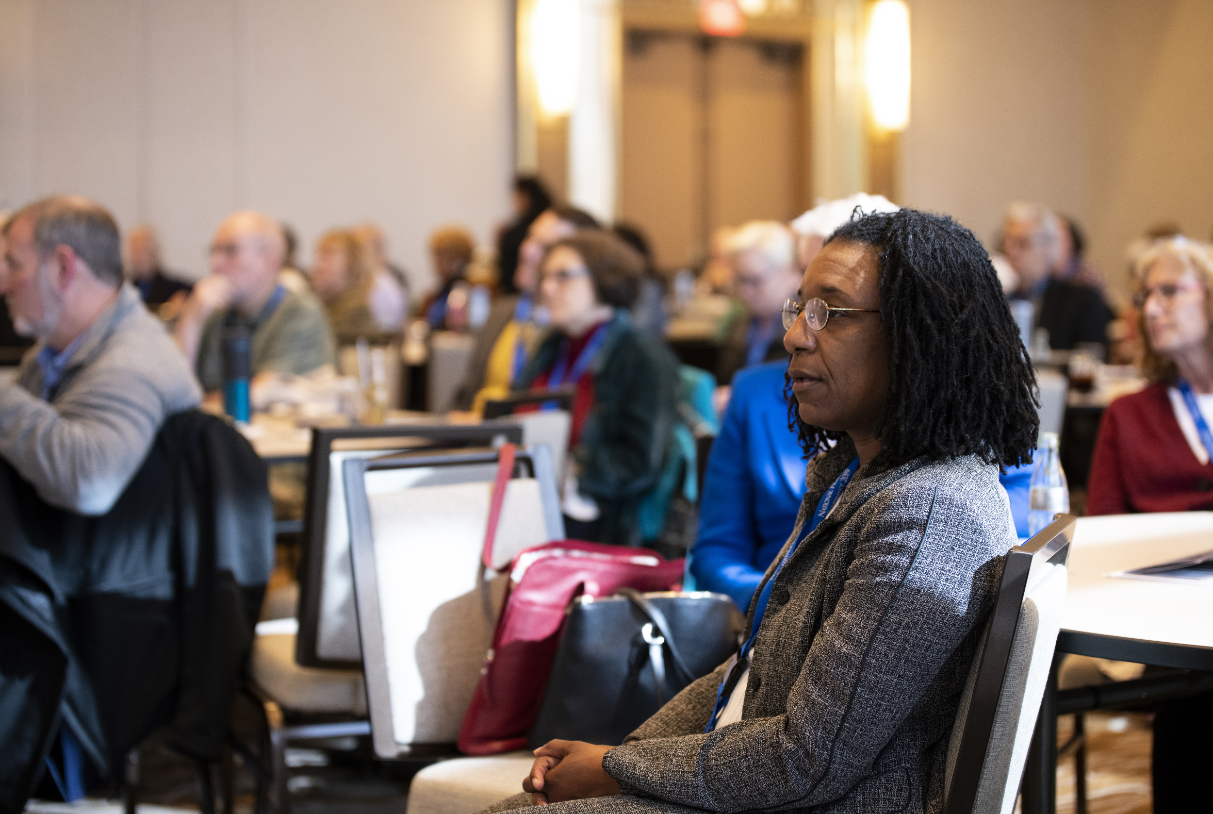 _STU2997 People at a workshop paying attention to the presenter